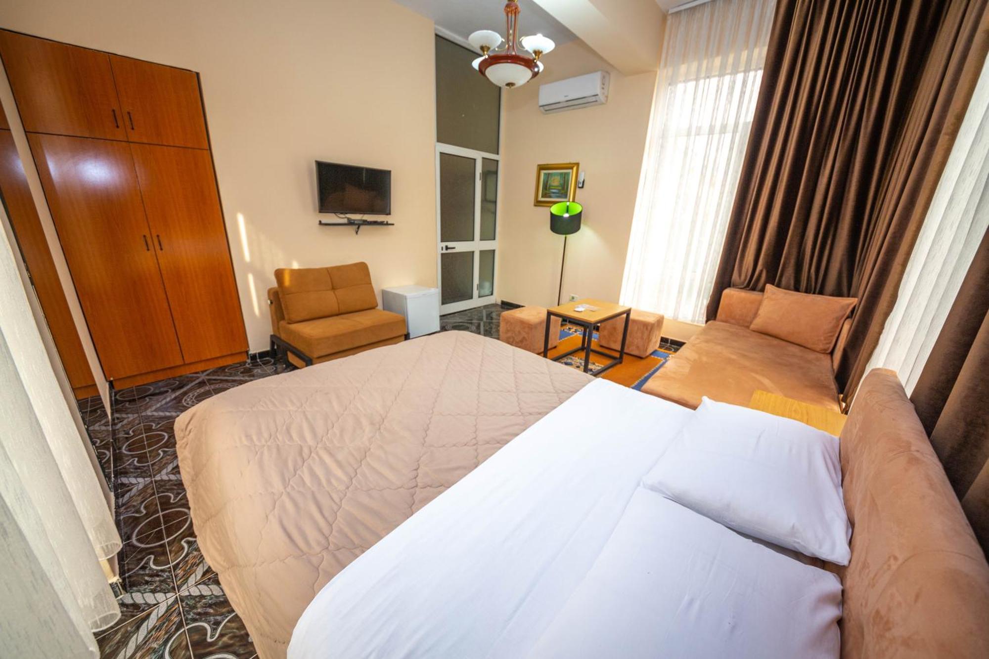 Hotel Pik Loti Tirana Habitación foto